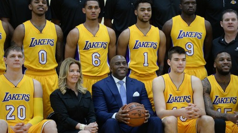 Lakers legal fight is head-on collision of Busses