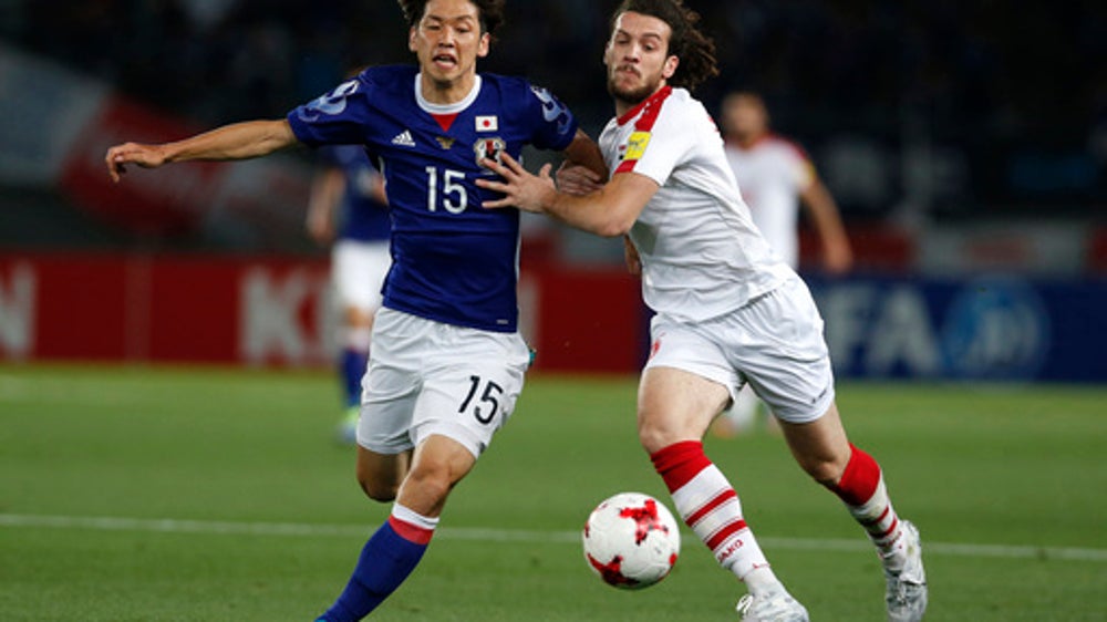 Japan draws 1-1 with Syria but loses Kagawa to injury