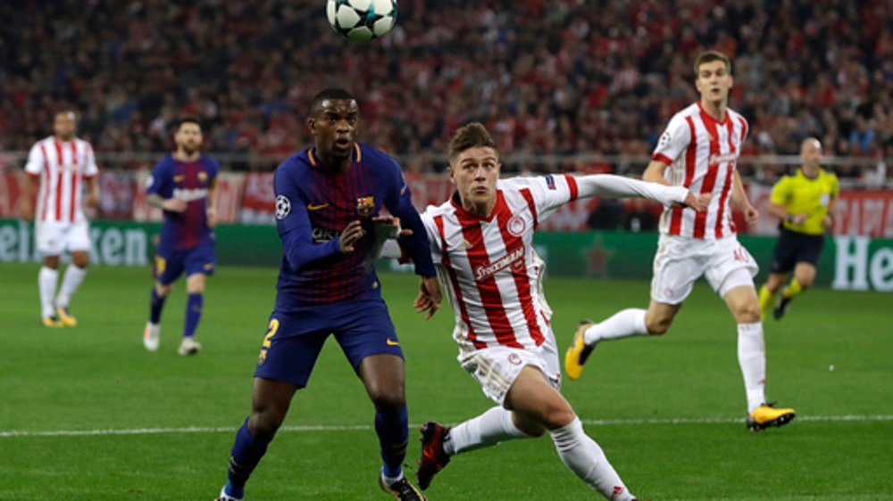 With goalkeeping heroics, Olympiakos holds Barcelona 0-0