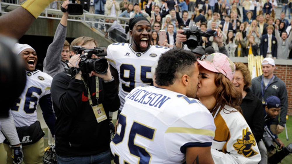 Trend? College football players pop the question on-field