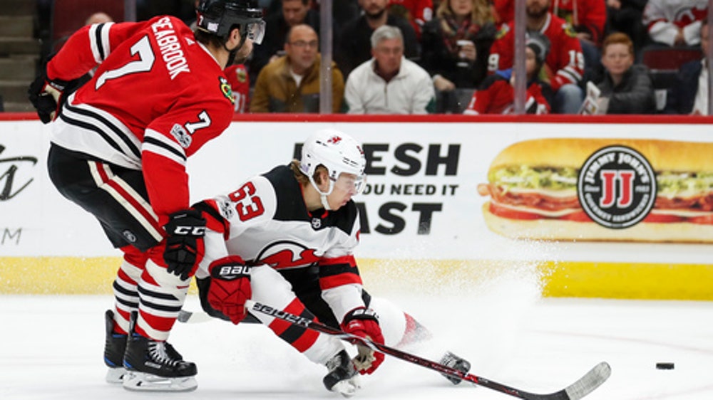 Miles Wood has hat trick, Devils outscore Blackhawks 7-5