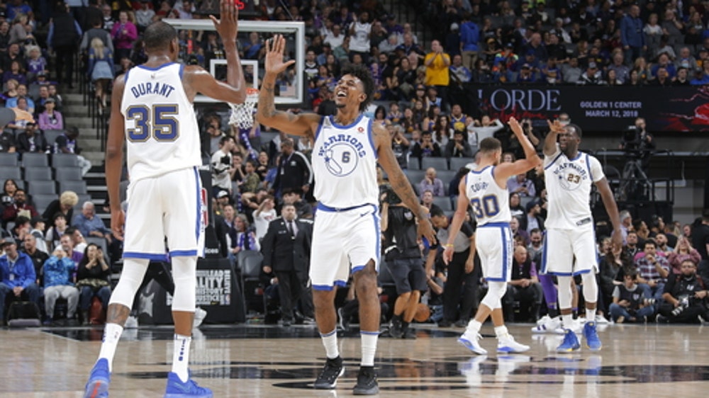 Durant scores 33, Warriors hold off Kings 119-104