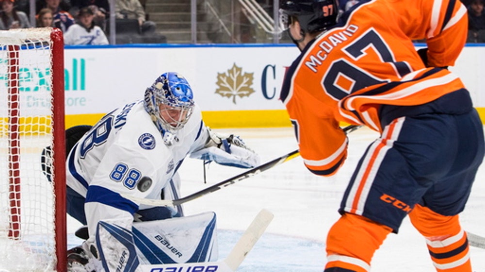 McDavid scores 4 goals, Oilers top NHL-best Lightning