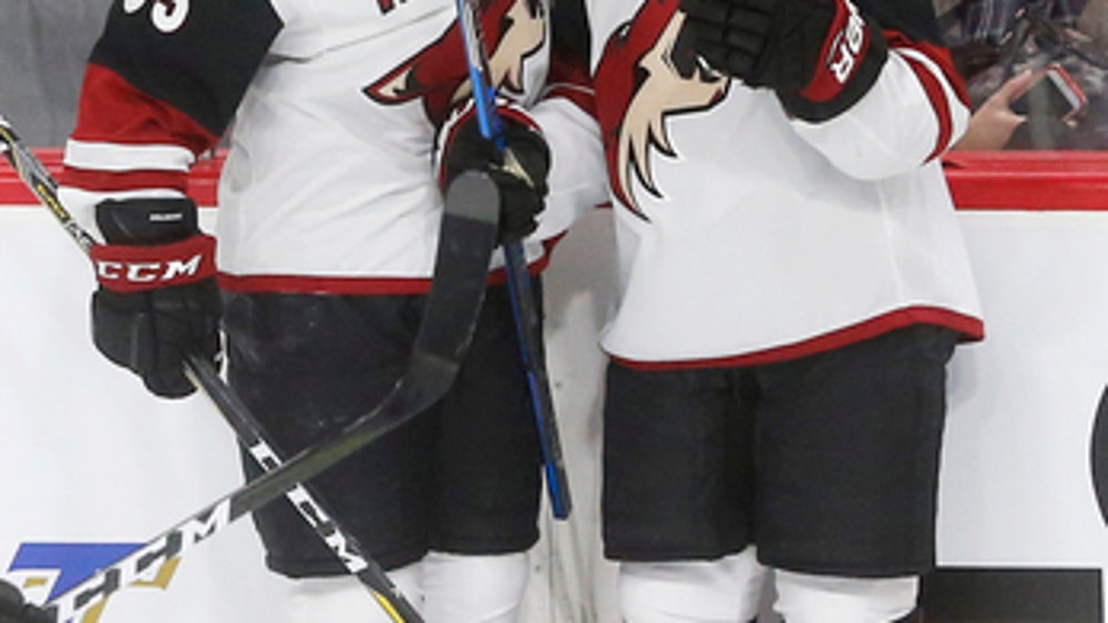 Coyotes score 4 straight to top Wild in OT
