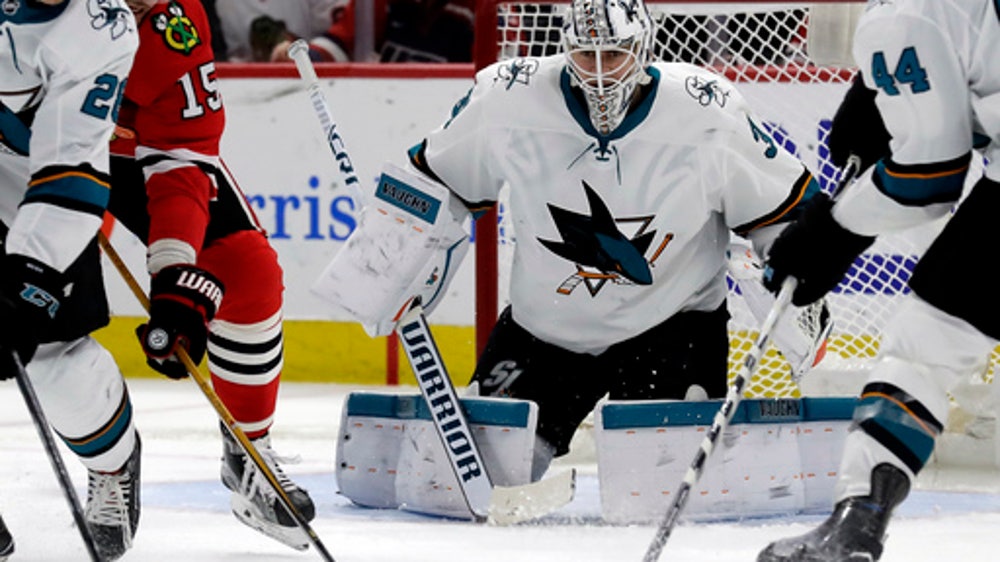 Berube makes 42 saves, Blackhawks beat Sharks 3-1