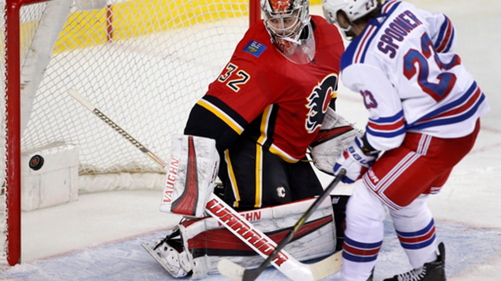 B-day boy Lundqvist sets NHL record with another 50-save win