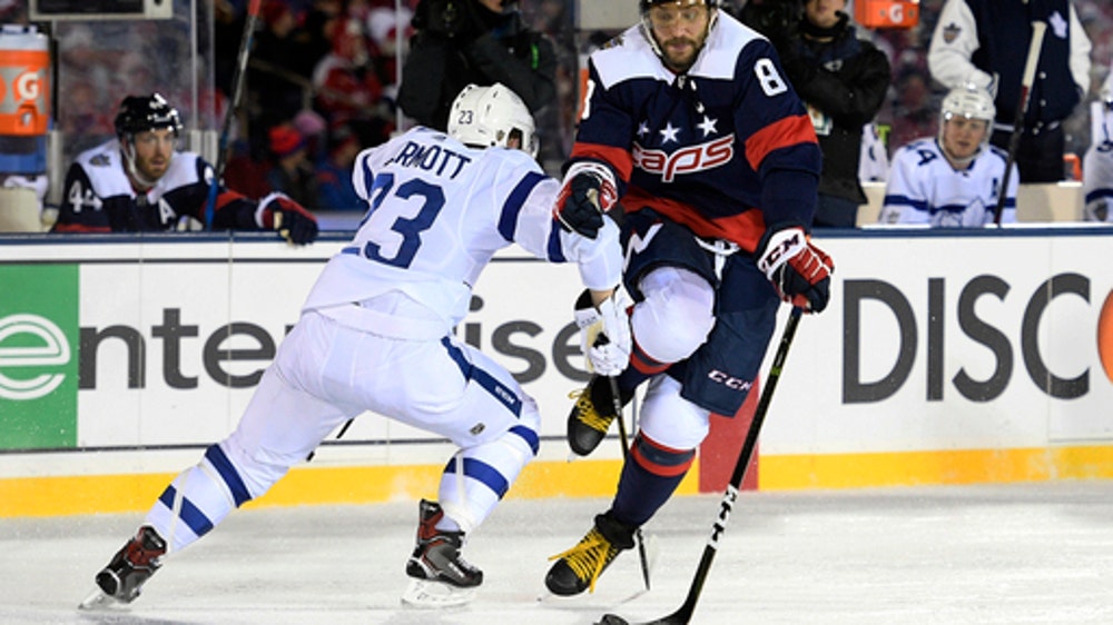 Caps light up Leafs, lights go out for outdoor game at Navy