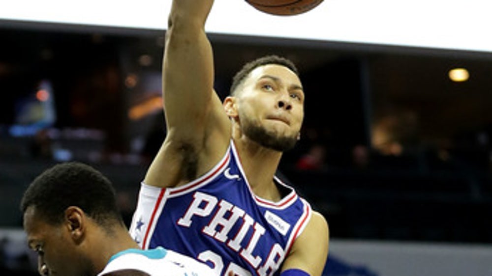 Covington, hot-shooting 76ers rout Hornets 128-114