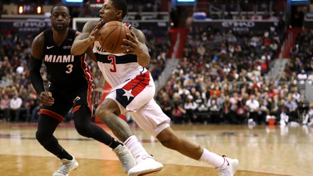 Beal scores 30, Wizards edge Heat 117-113 in overtime