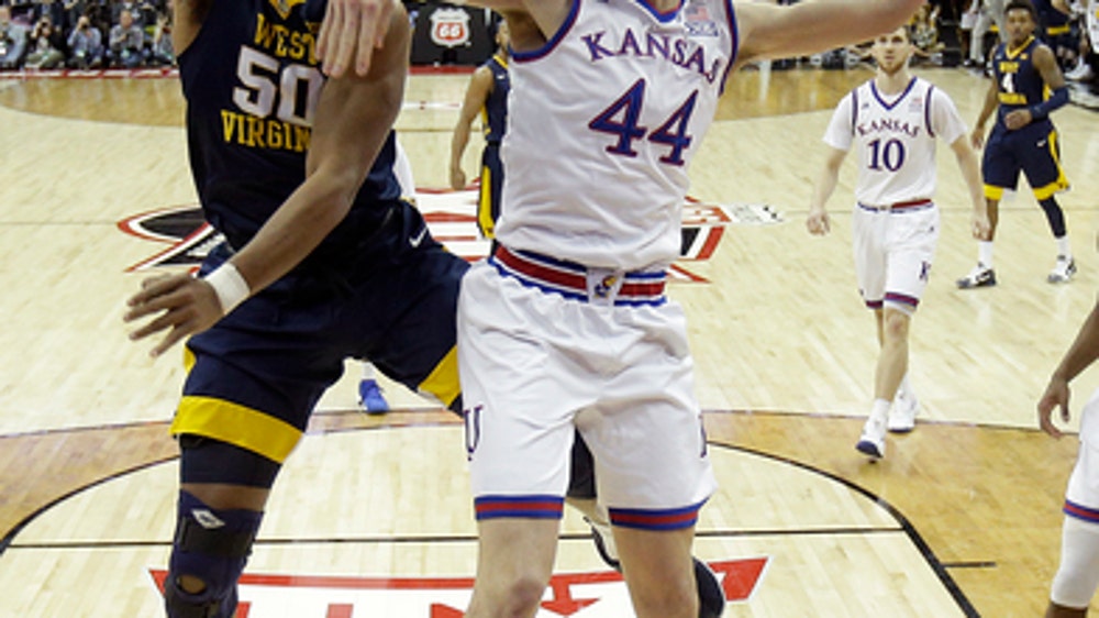 Kansas tops West Virginia 81-70 to win Big 12 tourney title
