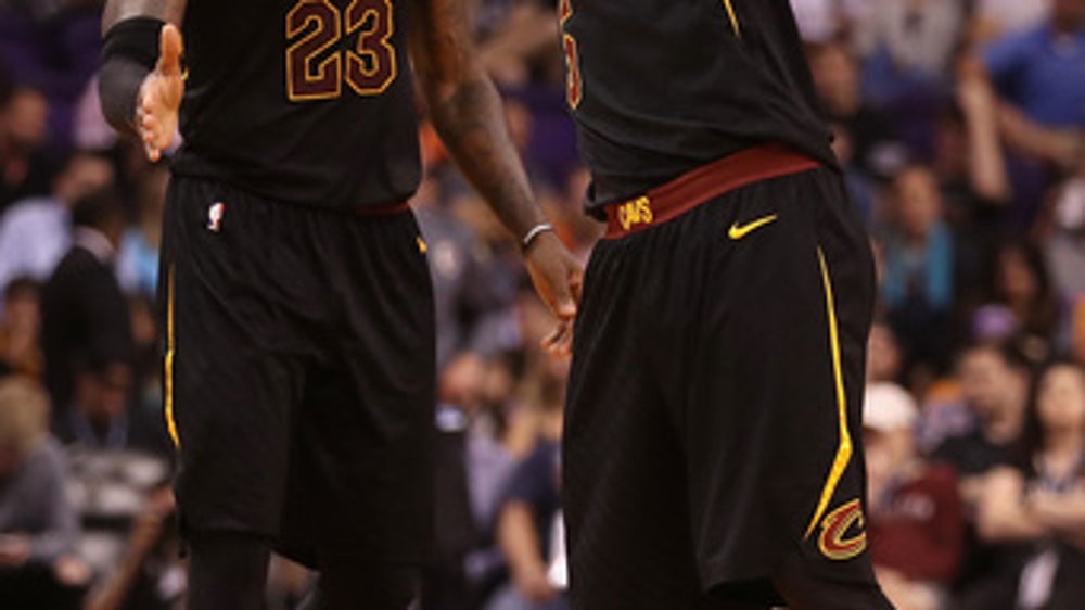 James’ triple-double leads Cavaliers past lowly Suns