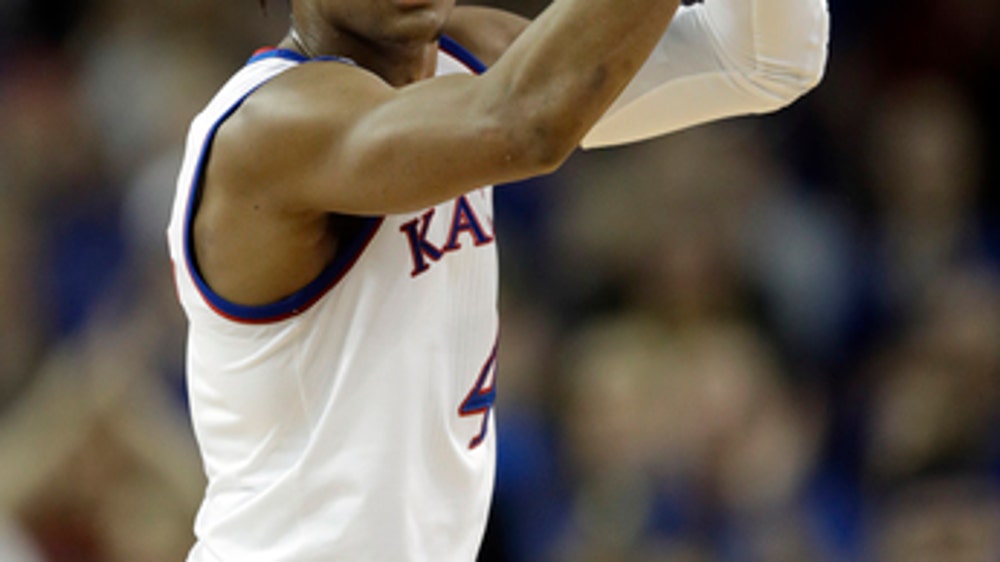 Top-seeded Kansas comes alive, beats Penn 76-60 in NCAAs