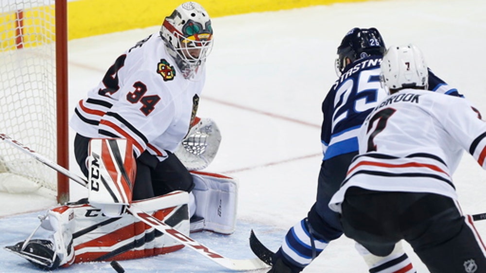 Connor scores twice, Jets beat Blackhawks 6-2
