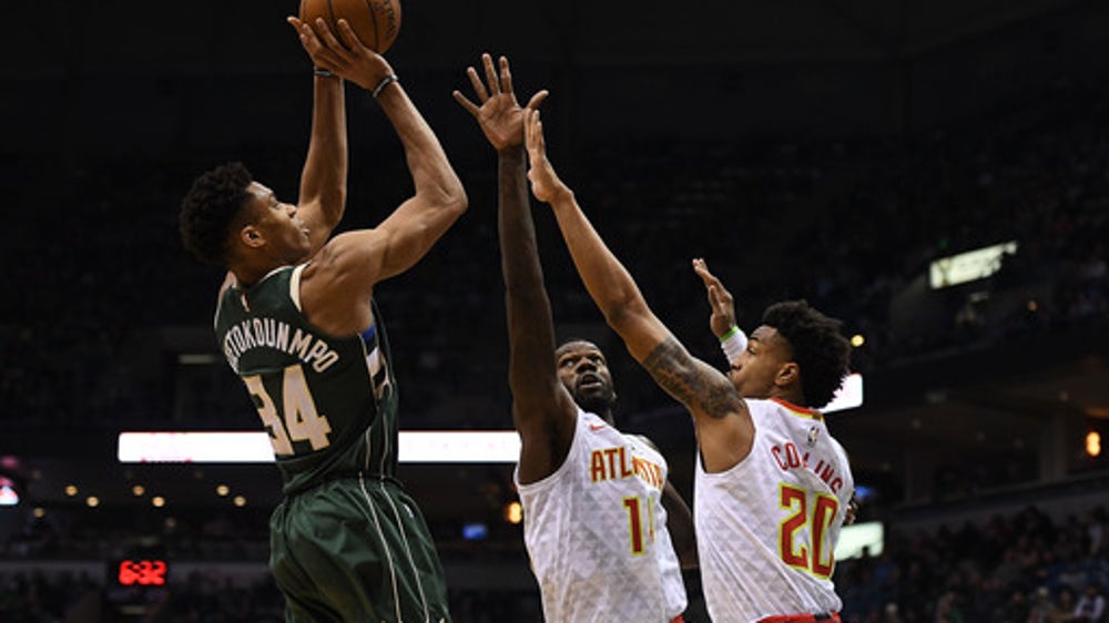 Giannis’ double-double helps Bucks hold on to beat Hawks