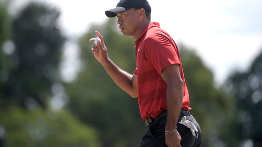 Woods makes a brief run at Bay Hill until a big miss