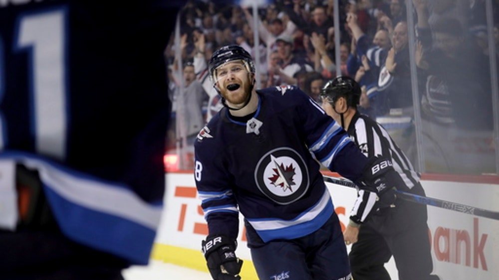 Jets clinch playoff spot with shootout win over Predators