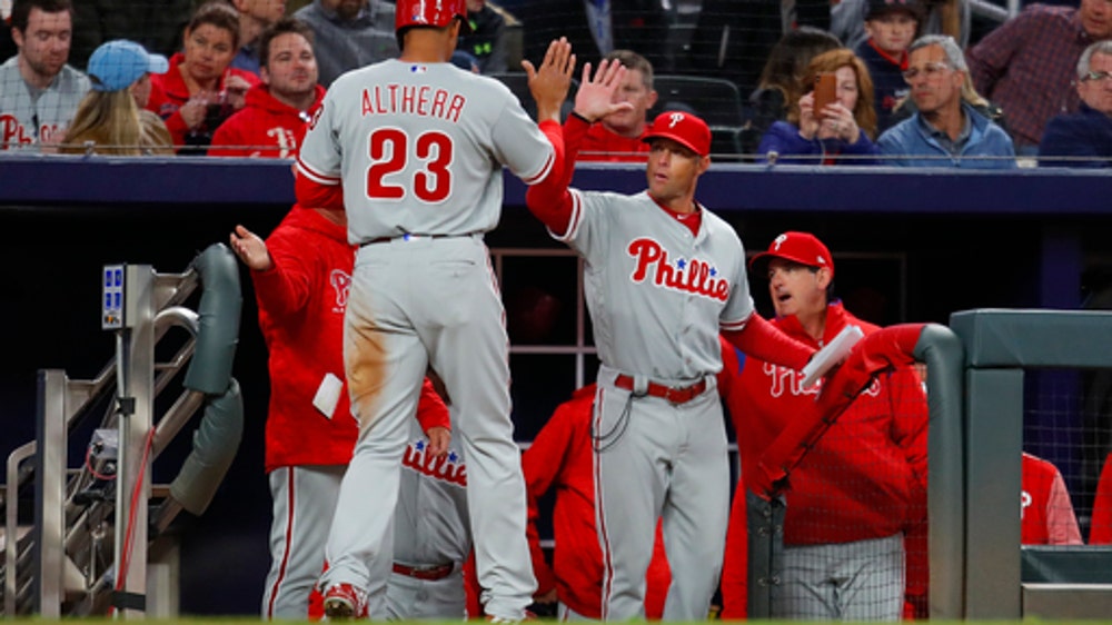 Santana’s sac fly gives Phillies 5-4 win over Braves in 11th