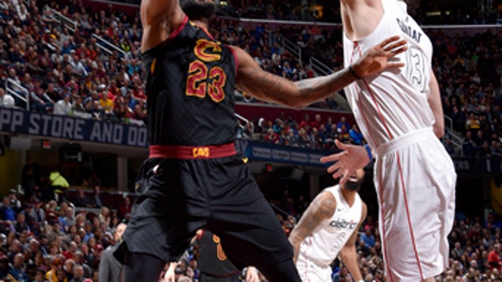 LeBron scores 33 points, Cavs rally to stun Wizards 119-115