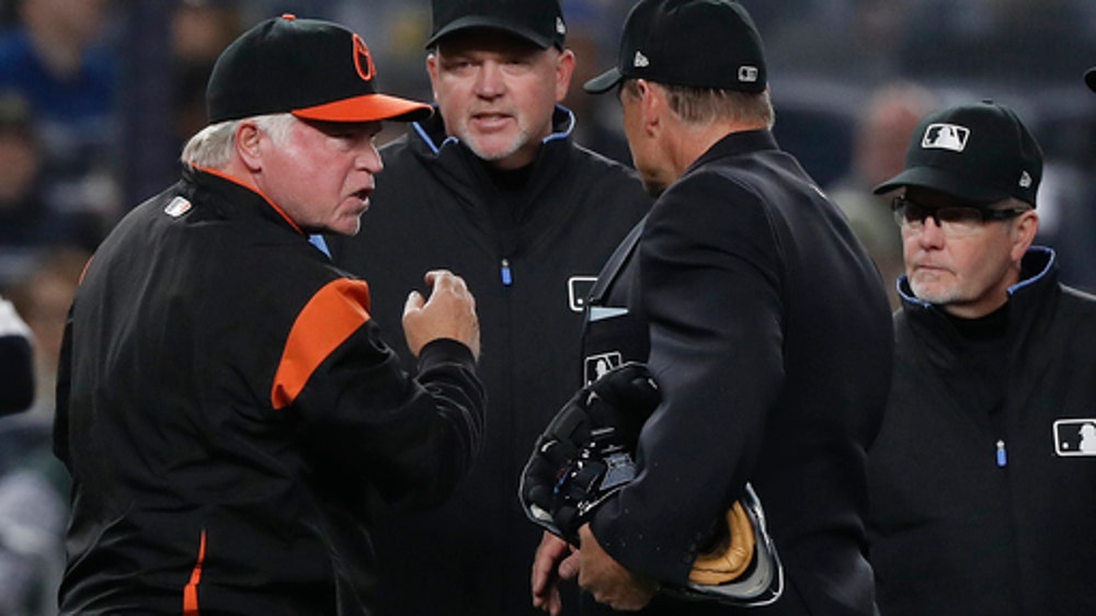Buck was right: Umpires say they missed call in O’s-Yanks