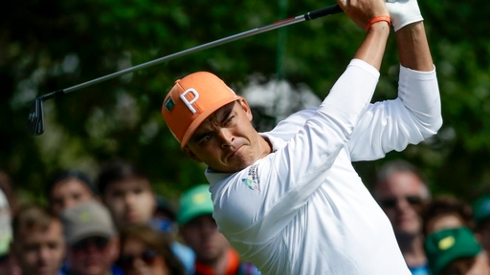 Fowler, Spieth make Reed earn his 1st major championship