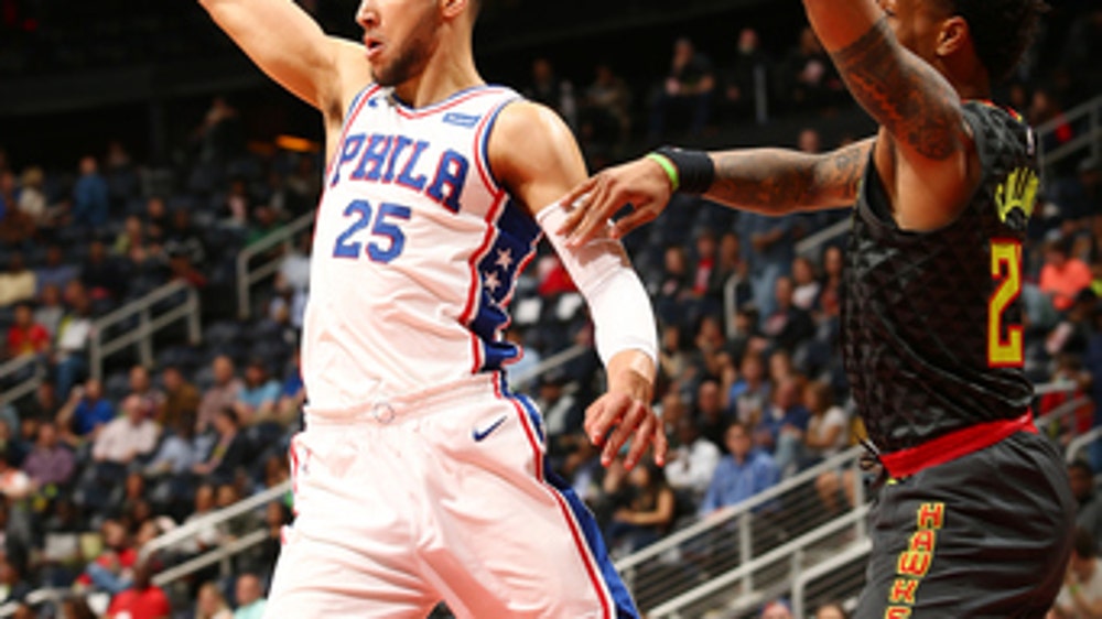 76ers set team with 15th straight win, 121-113 over Hawks
