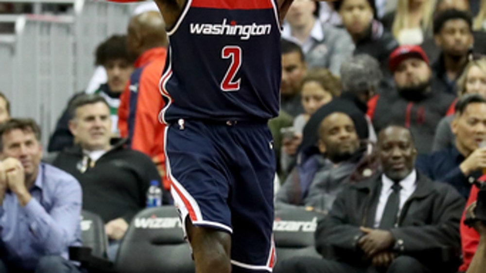 John Wall reaches 5K assists, Wizards beat Celtics 113-101