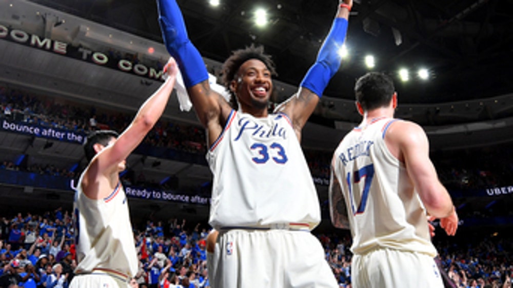 Without Embiid, 76ers roll past Heat in playoff opener