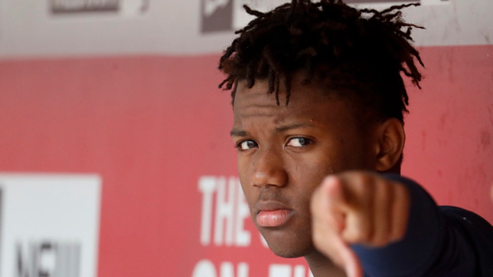 Acuna hits 1st big league homer to lead Braves over Reds 7-4