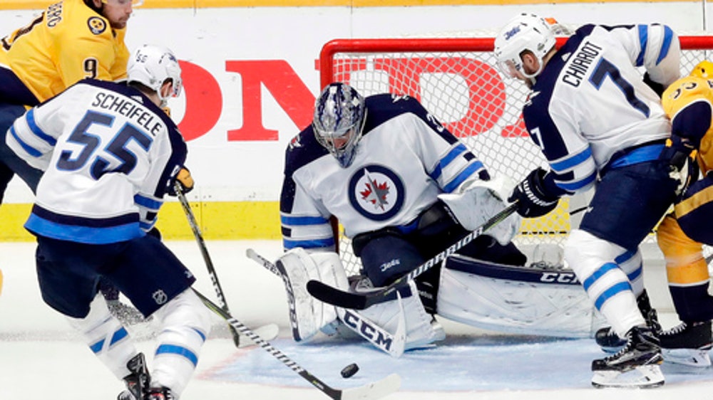 Hellebuyck smothers Preds as Jets grab 1-0 lead with 4-1 win