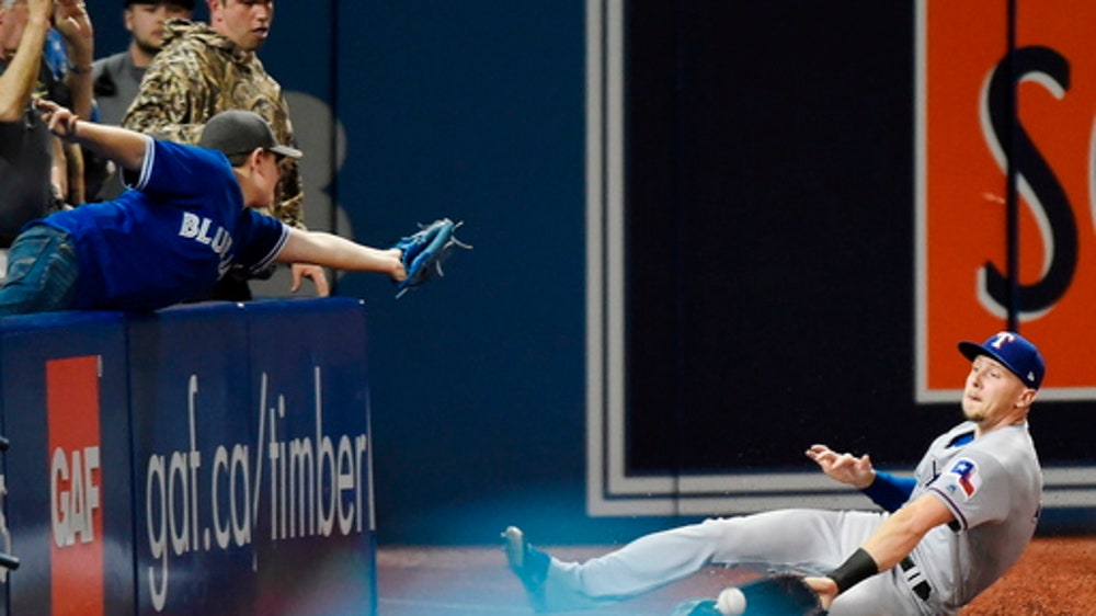 Blue Jays hit three HRs, beat Rangers 7-2 to avoid sweep