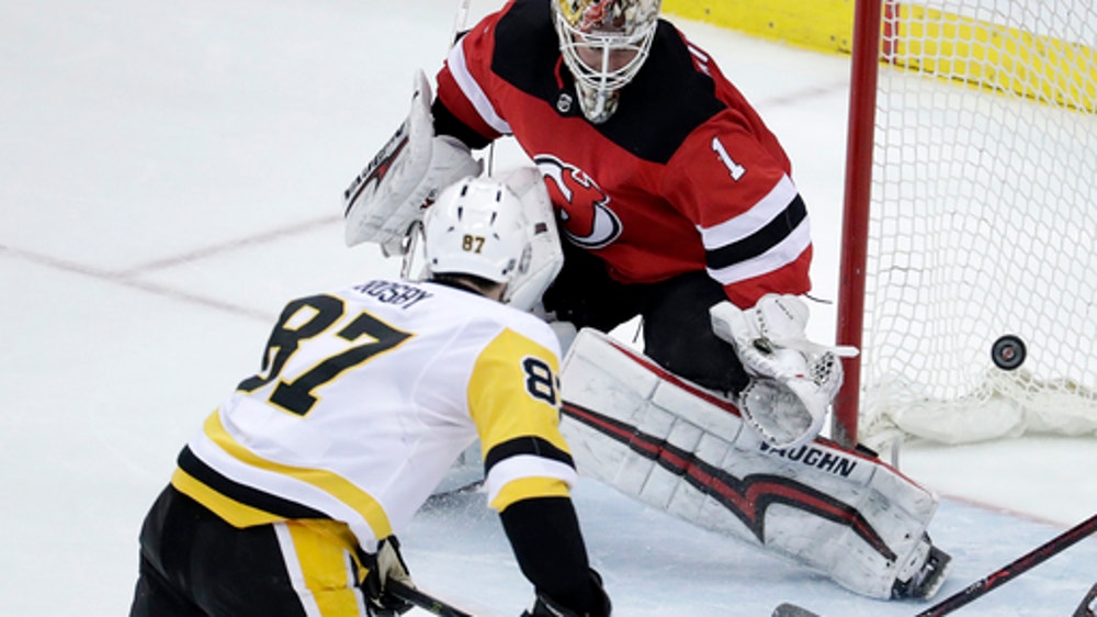 Swing away: Swatting puck out of midair not uncommon or easy