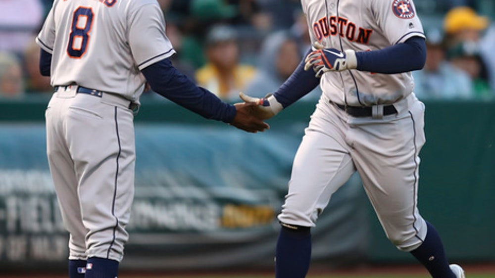 Springer goes 6 for 6, ties Astros mark in 16-2 rout of A’s