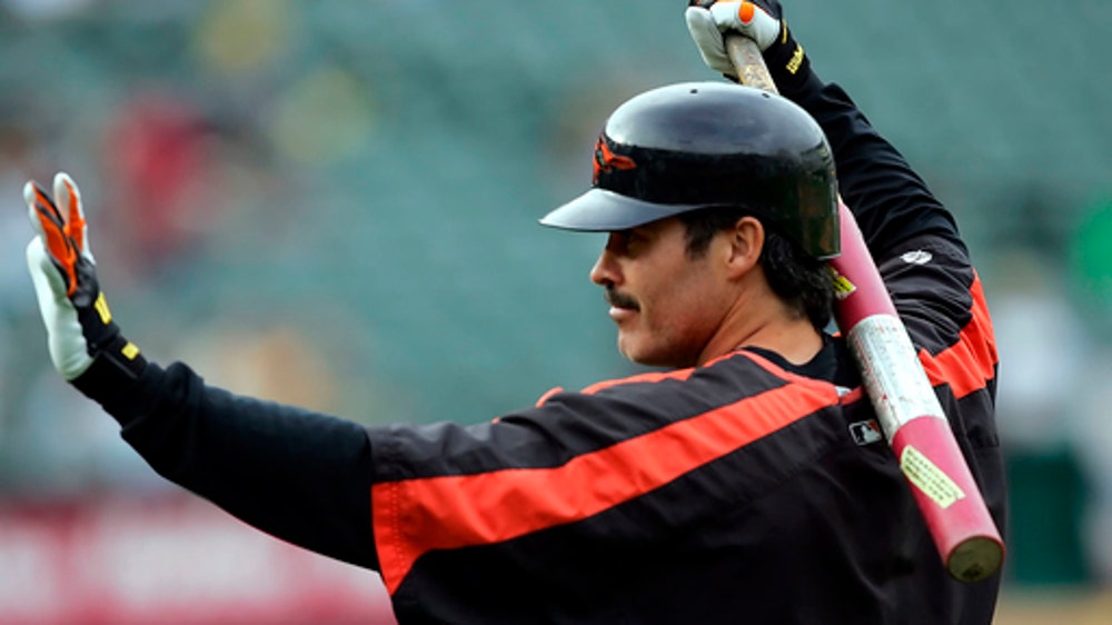 Palmeiro signs with independent team at age 53 with his son