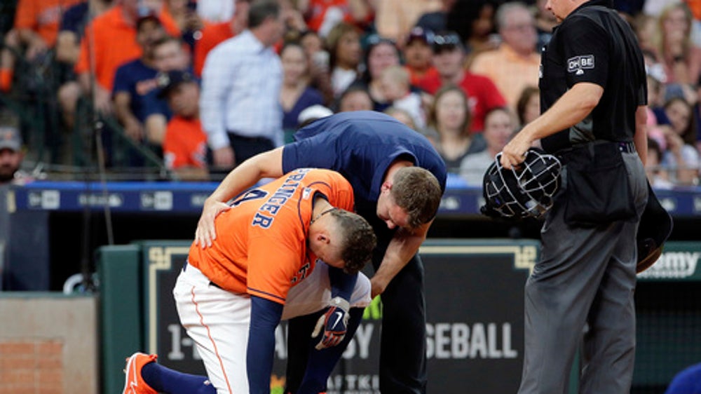 Hamels shines in Rangers’ 1-0 win over Astros; Springer hurt