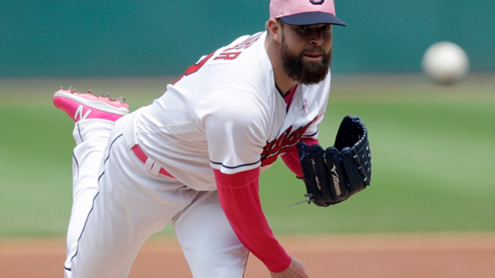 Kluber, Gomes lead Indians past Royals 11-2