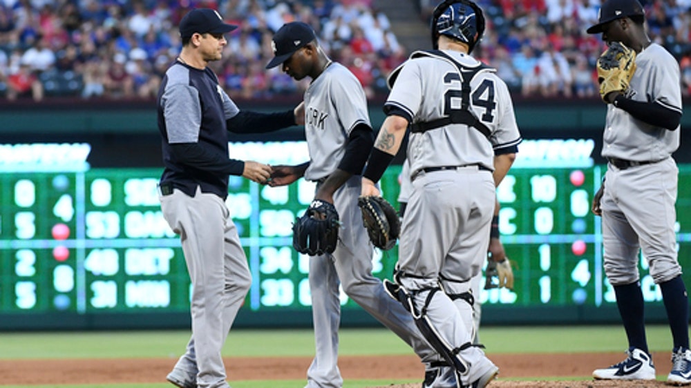 Hamels limits slugging Yankees as last-place Rangers win 6-4