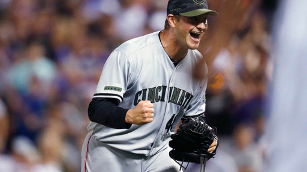 Gennett has 5 hits to lead Reds over Rockies 6-5.