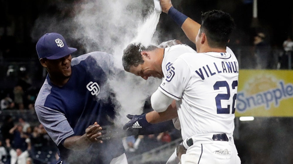 Padres edge Marlins 3-2 on late error by Rojas