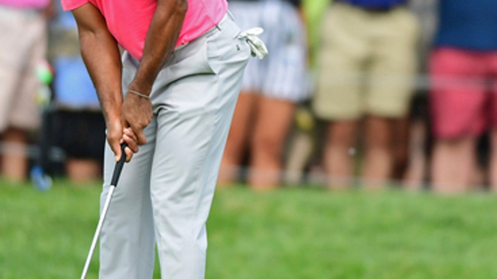 DeChambeau takes 1-shot lead as Woods lurks at Memorial