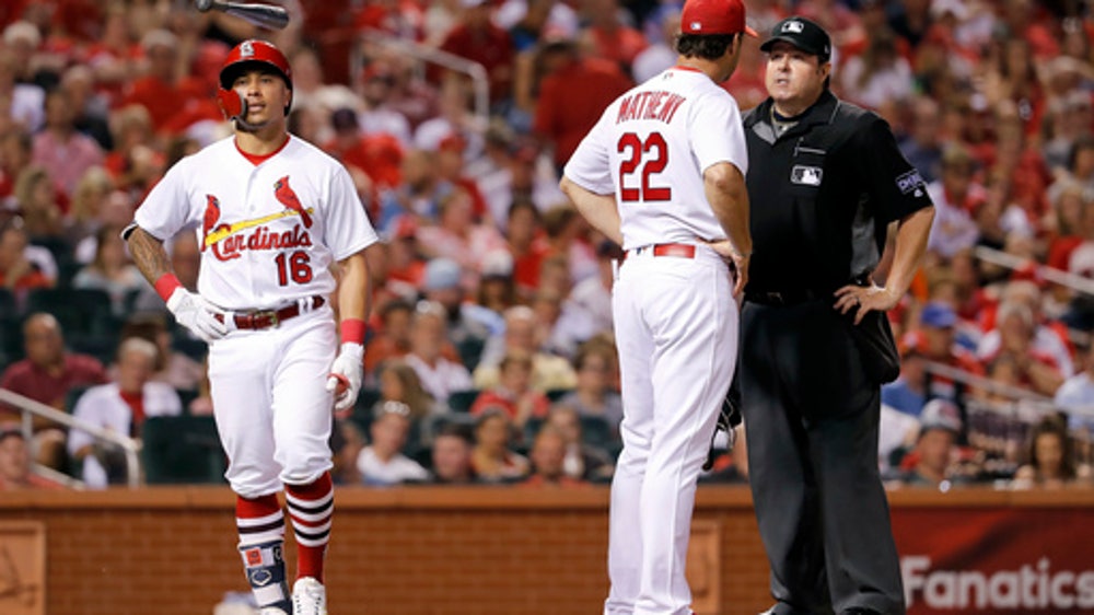 Urena gets 1st win as Marlins snap skid, beat Cards 7-4