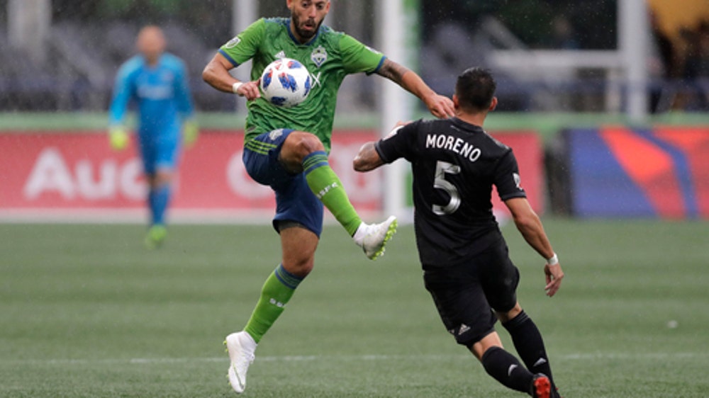 Dempsey scores first goal of season, Sounders tie Fire, 1-1
