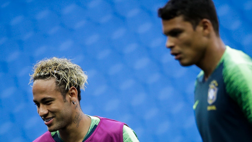 The Latest: Belgium takes unchanged lineup into Tunisia game