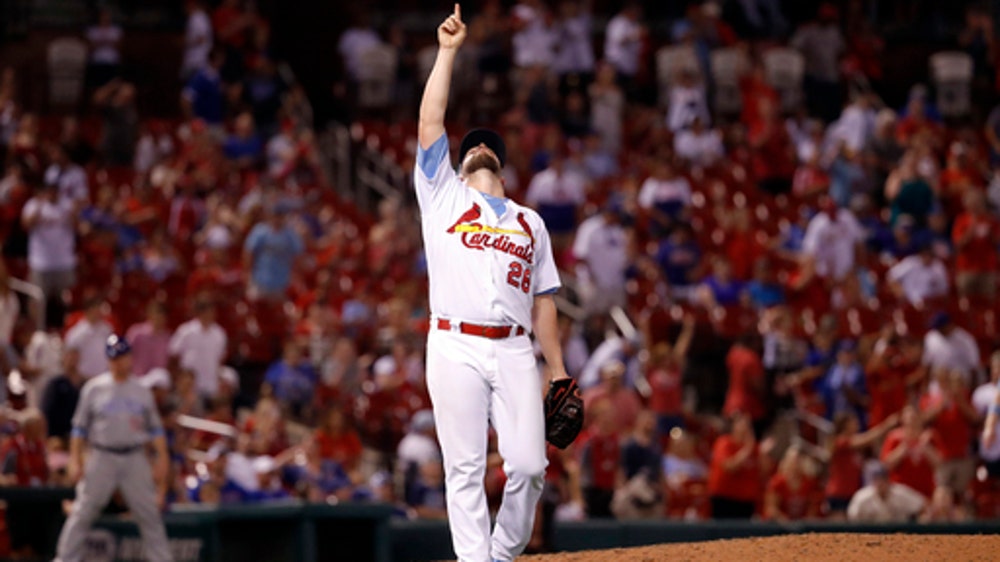 Flaherty, Carpenter help Cardinals shut down Cubs 5-0