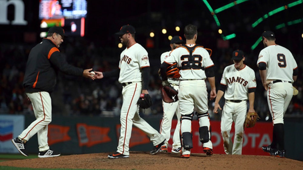 Strickland breaks pitching hand punching door in frustration
