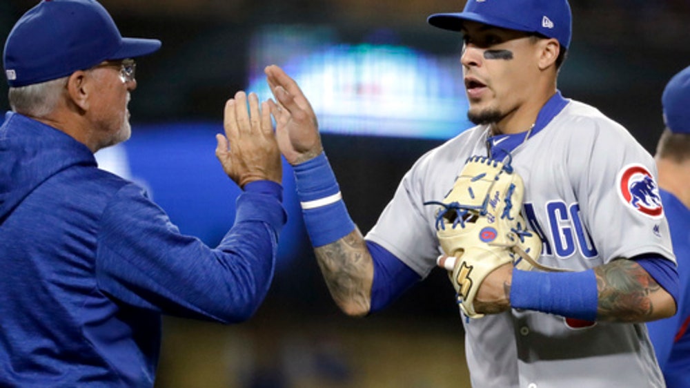 Baez’s grand slam, 2 HRs power Lester, Cubs over Dodgers 9-4