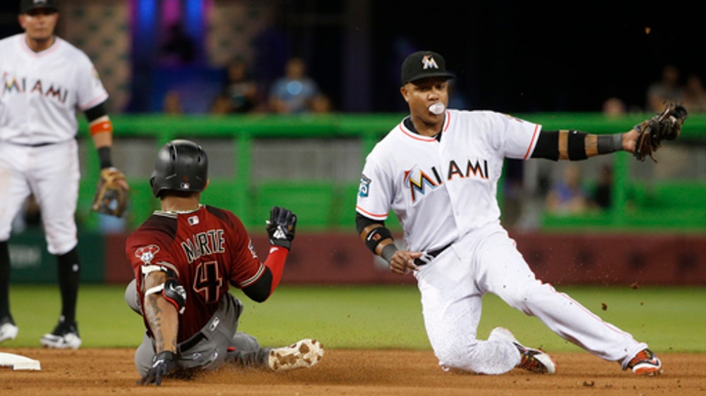 Ray sharp in return as Diamondbacks beat Marlins 2-1