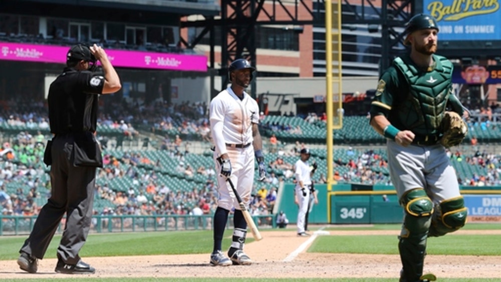 Lowrie, Manaea lead A’s over Tigers 4-2 for 4-game sweep