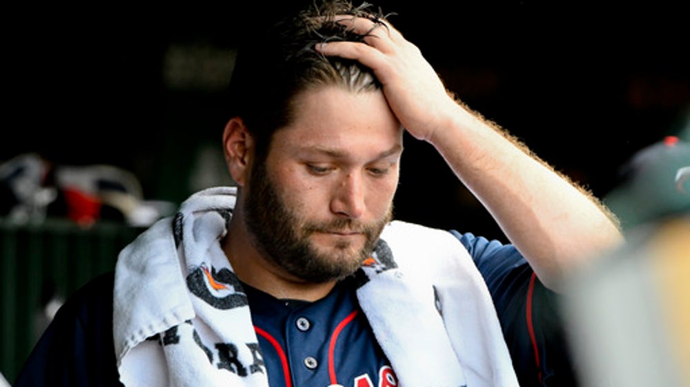 Lester homers, gets NL-high 11th win as Cubs top Twins 11-10