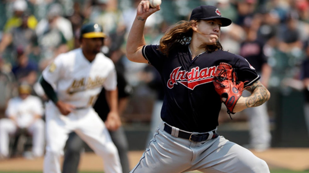 Indians hit 11 doubles, 2 HRs in 15-3 romp over Athletics