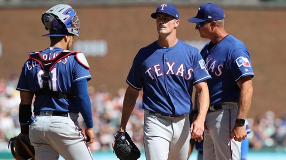 Tigers chase Hamels in 7-run first, beat Rangers 7-2